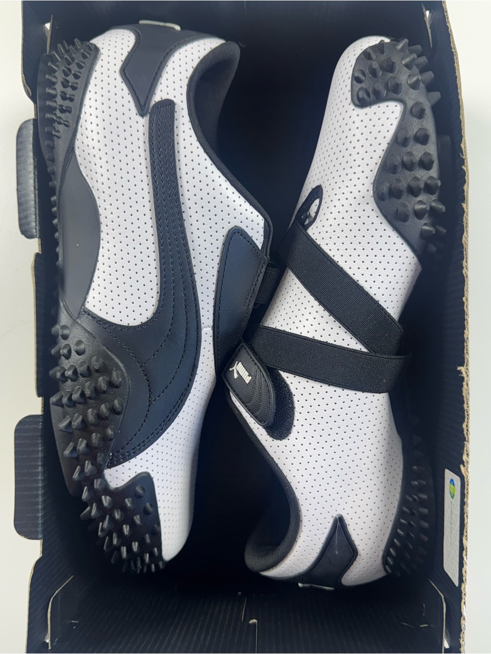 Puma White and Black Mostro Perf Athletic Shoes
